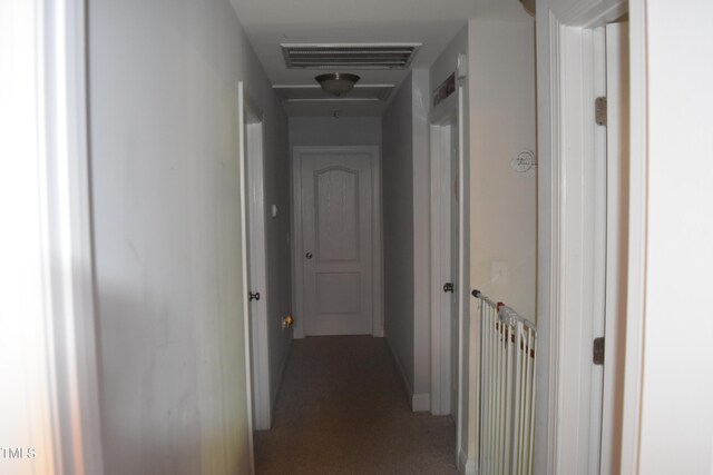 corridor with carpet floors