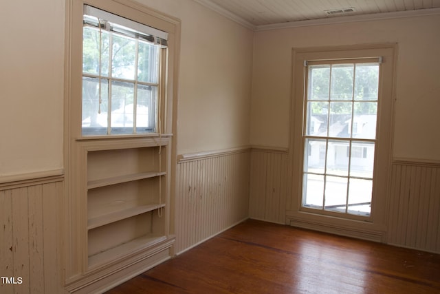 9358 Main St, Castalia, NC 27816 - entryway with built in features, crown molding, a wainscoted wall, visible vents, and wood finished floors