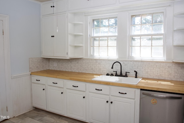 9358 Main St, Castalia, NC 27816 - kitchen with a sink, open shelves, wooden counters, dishwasher, and white cabinets