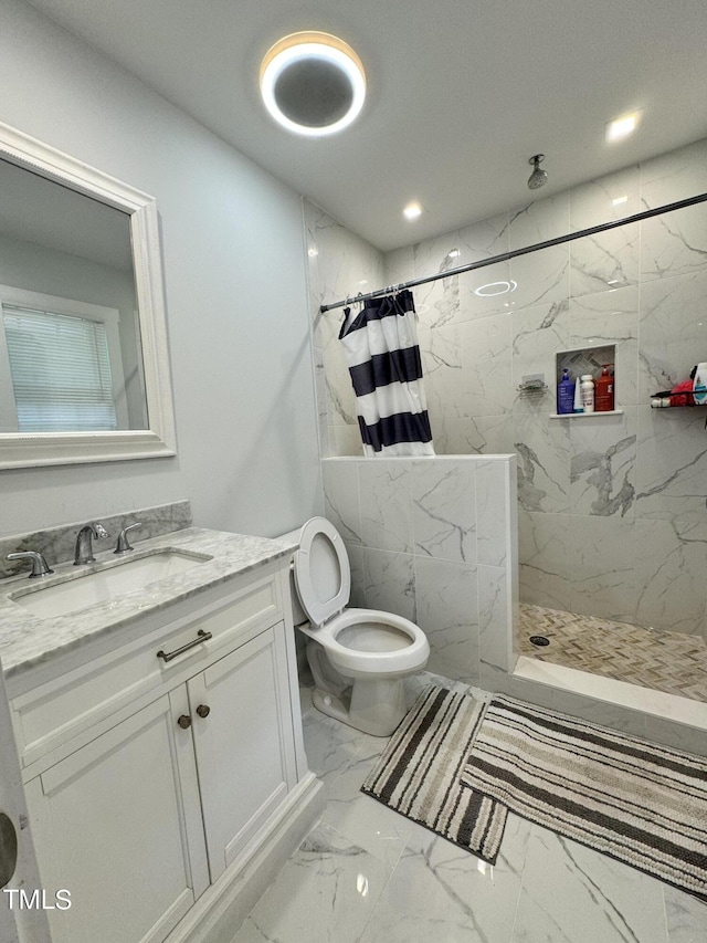 bathroom featuring vanity, a shower with curtain, toilet, and tile patterned flooring