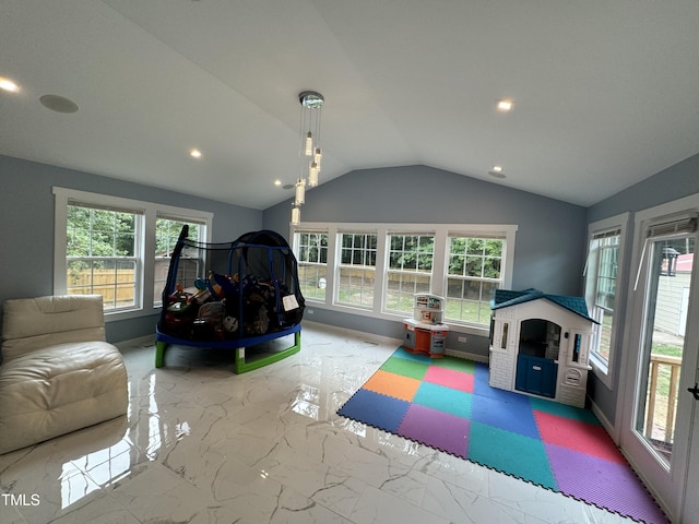 interior space with tile patterned floors and vaulted ceiling