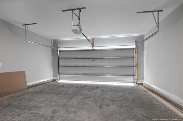 garage featuring a garage door opener
