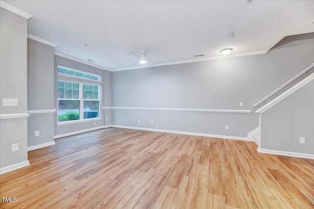 unfurnished living room with ceiling fan, light wood-type flooring, and crown molding