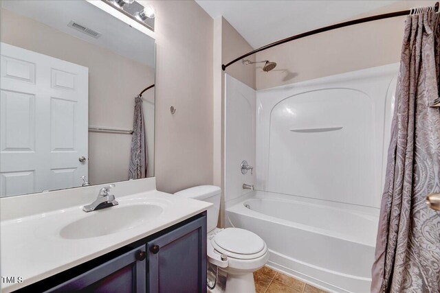 full bathroom with shower / bathtub combination with curtain, toilet, vanity, and tile patterned flooring