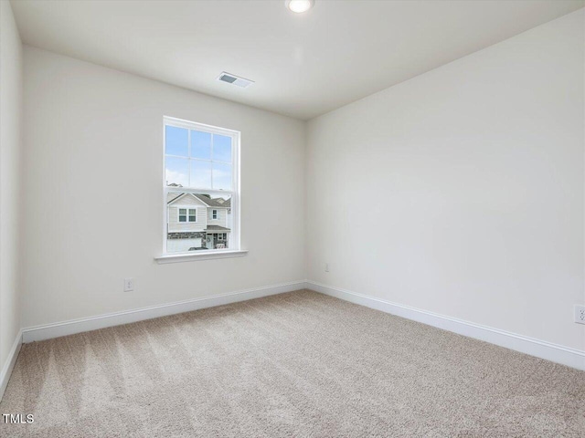 view of carpeted spare room