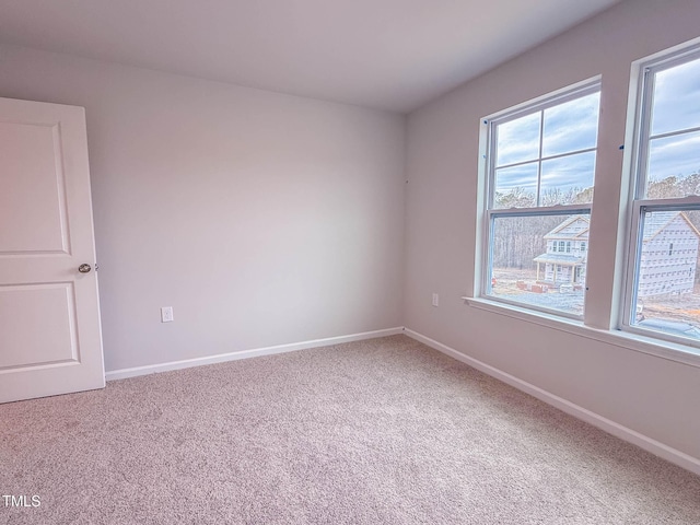 view of carpeted spare room