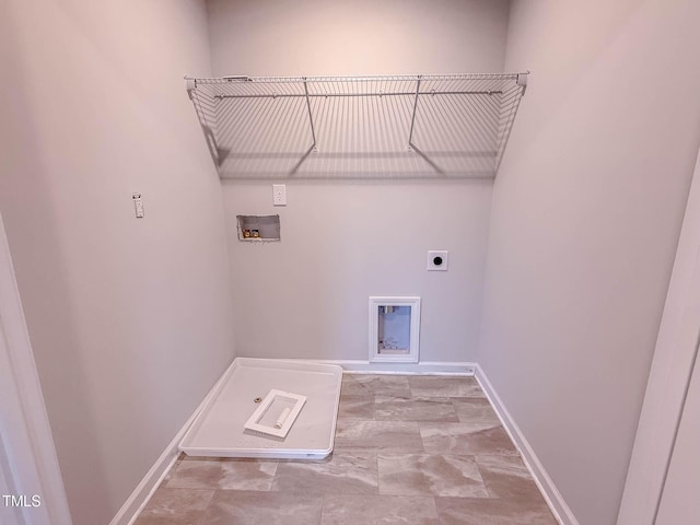 laundry room featuring electric dryer hookup and washer hookup