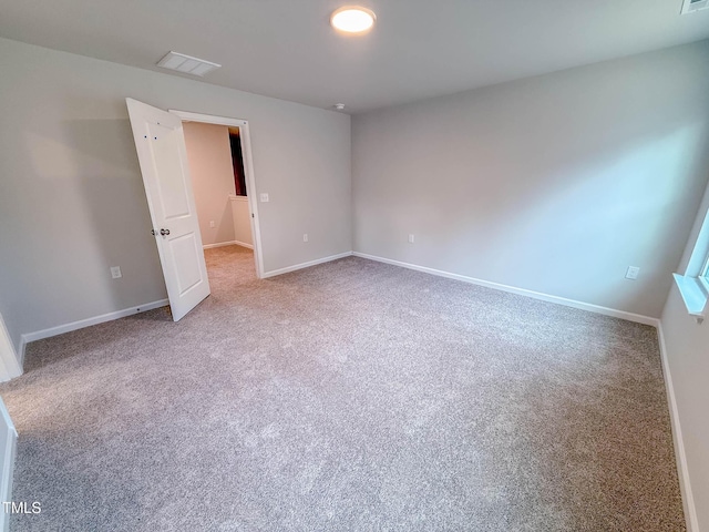 spare room with carpet flooring