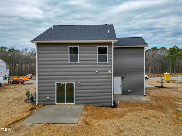 back of house featuring a patio area