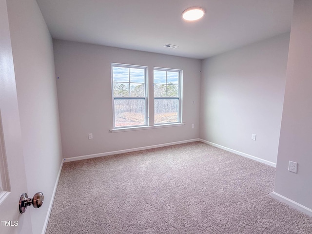 view of carpeted spare room