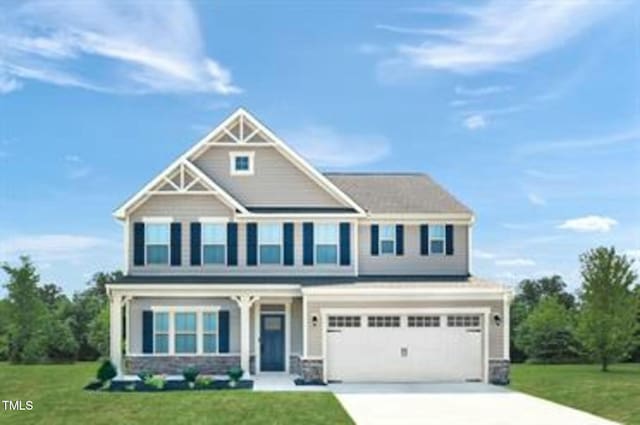 508 Impala Trce, Wendell, NC 27591 - craftsman-style home with driveway, an attached garage, and a front lawn