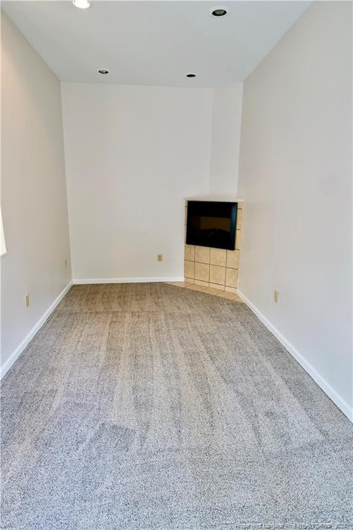 unfurnished living room with carpet floors