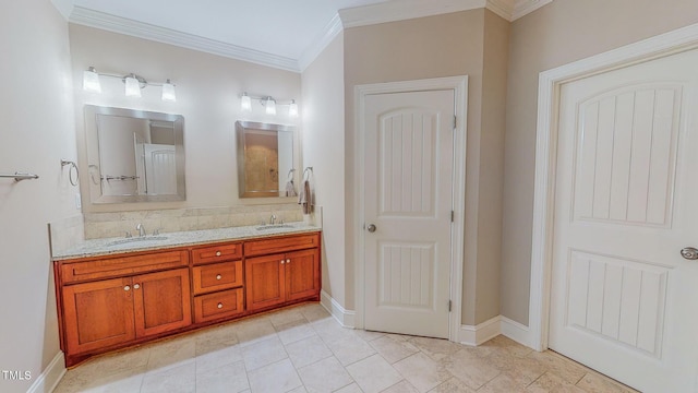 bathroom with tile patterned floors, vanity, and ornamental molding