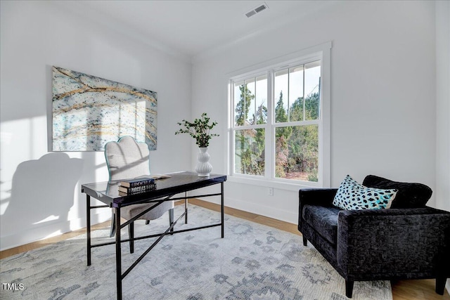 office space with light hardwood / wood-style floors