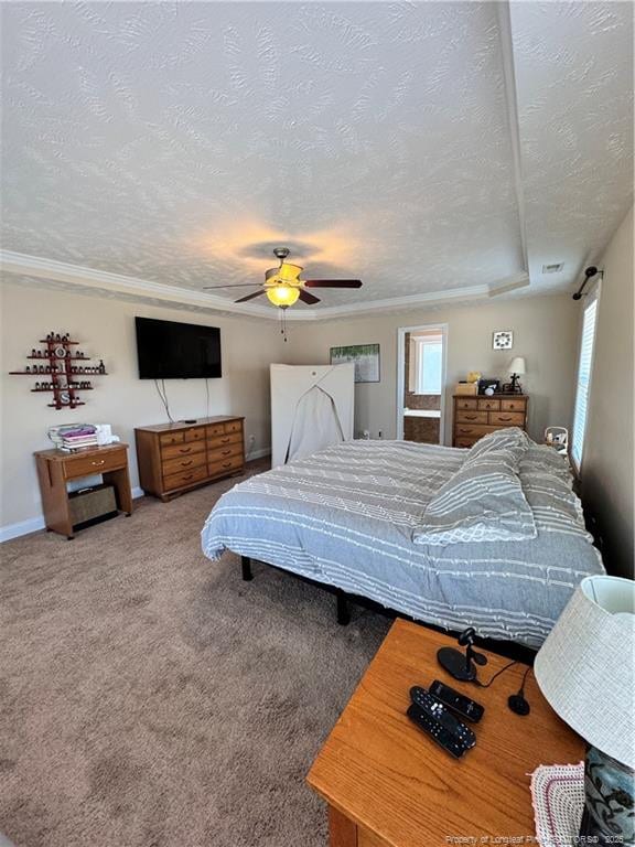 carpeted bedroom featuring multiple windows, ceiling fan, and a textured ceiling