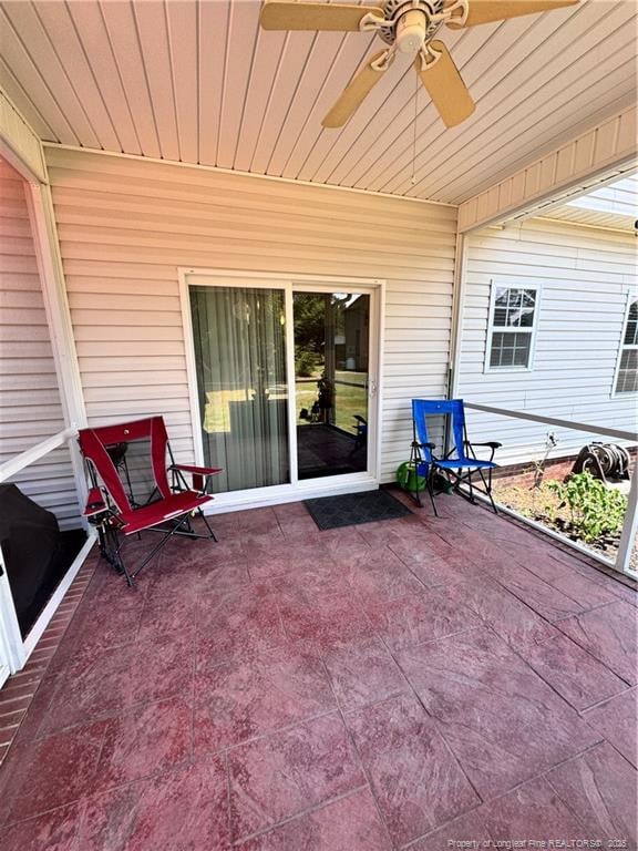 view of patio with ceiling fan