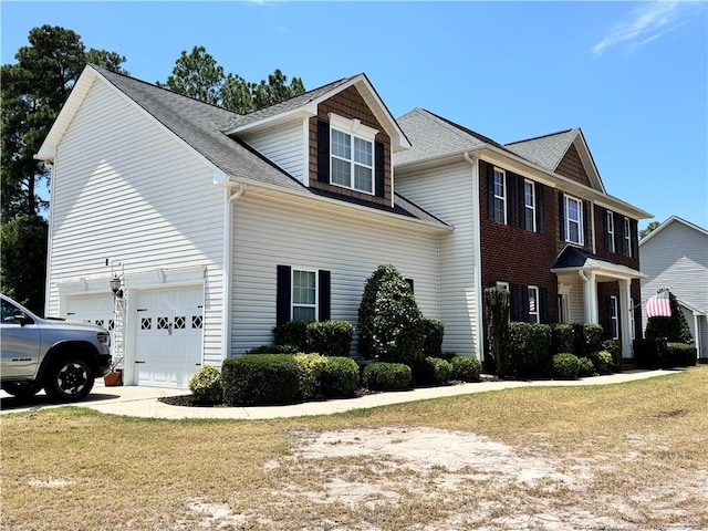 view of property exterior featuring a garage and a yard