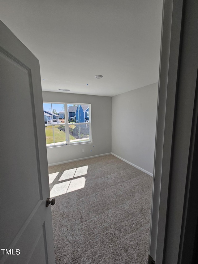 view of carpeted empty room