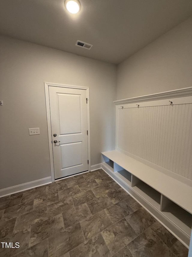 mudroom with baseboards and visible vents