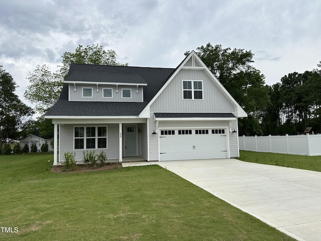 view of front facade featuring a garage and a front lawn