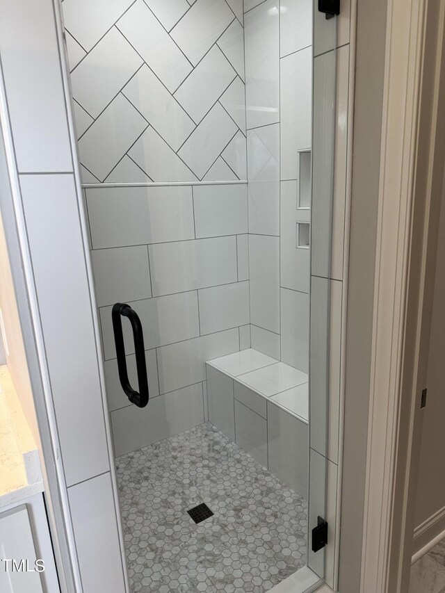 bathroom featuring walk in shower