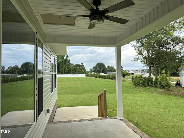 view of patio / terrace featuring ceiling fan