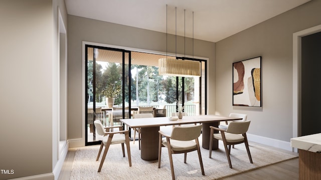 dining area featuring light wood-type flooring