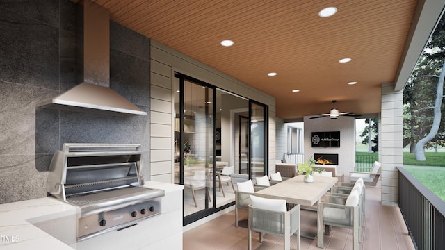 view of patio / terrace featuring ceiling fan, a grill, and a fireplace