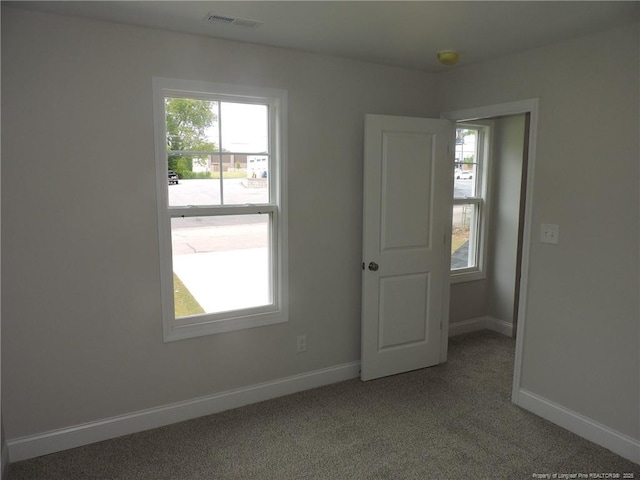 view of carpeted spare room