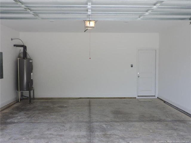 garage with electric panel, a garage door opener, and water heater