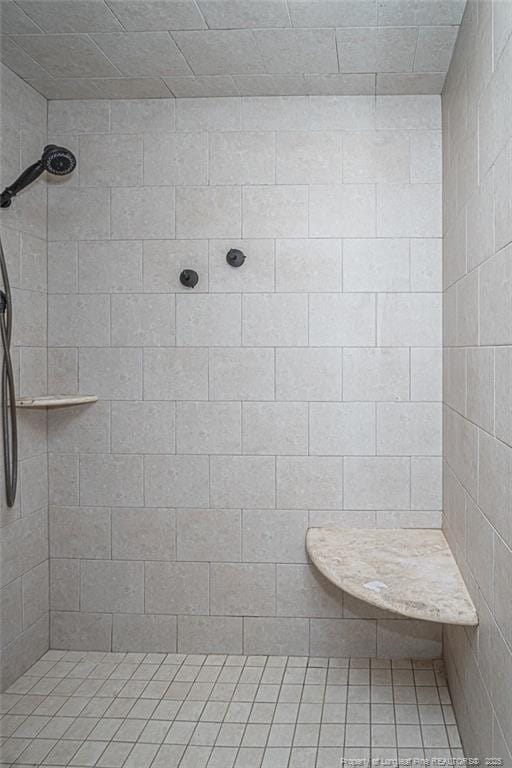 full bathroom with a tile shower