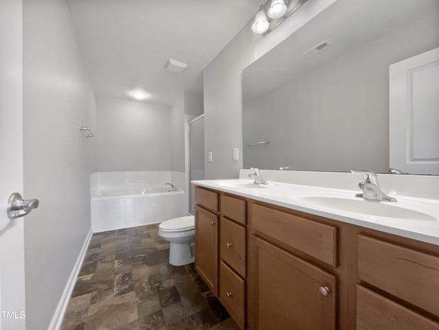 bathroom with a tub, toilet, tile patterned floors, and double vanity