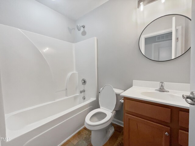 full bathroom with bathing tub / shower combination, tile patterned floors, vanity, and toilet