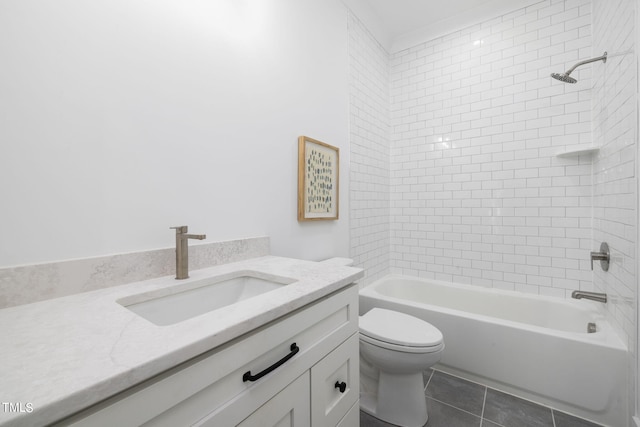 full bathroom featuring tile patterned floors, vanity, toilet, and tiled shower / bath combo