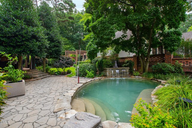 1800 Bay Meadow Ct, Raleigh, NC 27615 - pool with fence and a patio area