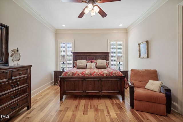 bedroom featuring ornamental molding, ceiling fan, and light hardwood / wood-style flooring