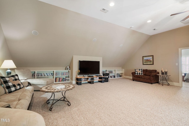 carpeted living room with lofted ceiling and ceiling fan