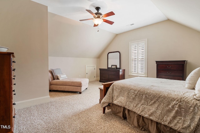 carpeted bedroom featuring vaulted ceiling and ceiling fan