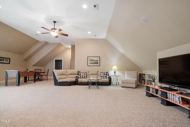 carpeted living room with lofted ceiling and ceiling fan