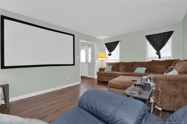 home theater featuring dark hardwood / wood-style floors