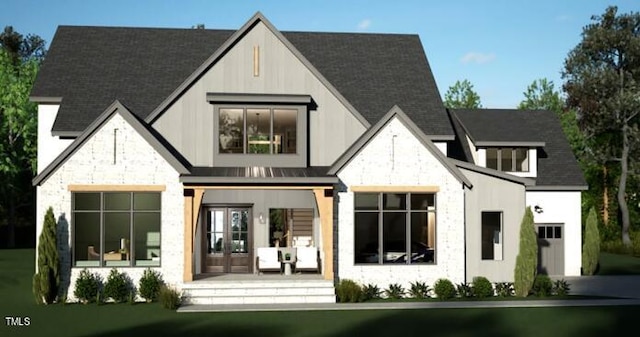 rear view of property featuring french doors and roof with shingles