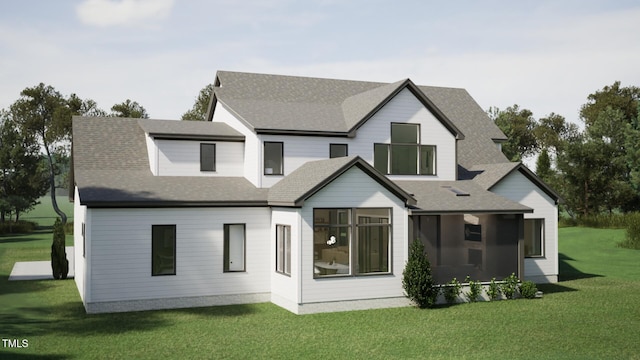 rear view of house with a yard and roof with shingles