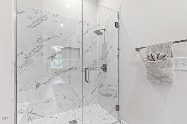 bathroom with an enclosed shower