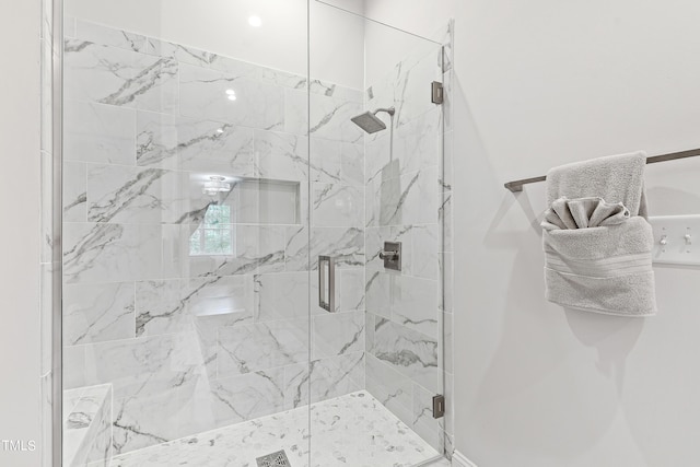 full bathroom featuring a shower stall