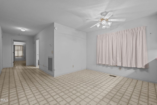 empty room with ceiling fan