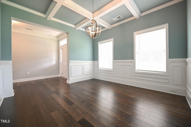 spare room featuring dark wood-type flooring, crown molding, beam ceiling, and coffered ceiling