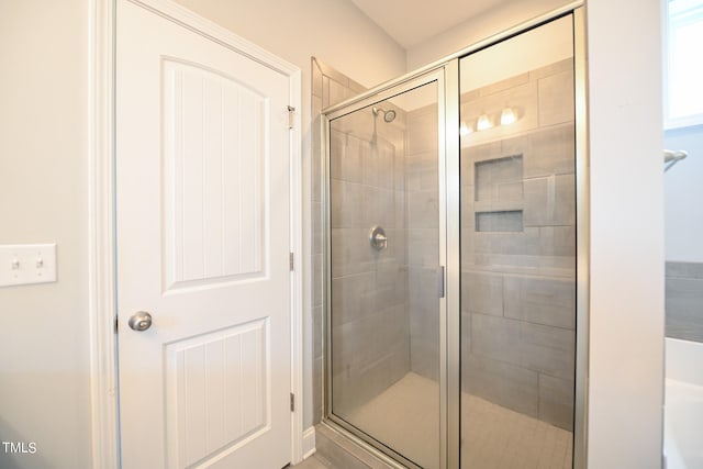 bathroom with an enclosed shower