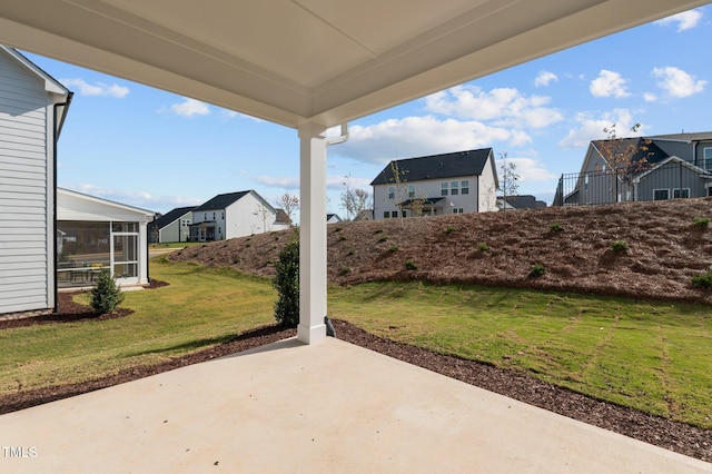 view of patio / terrace with a sunroom