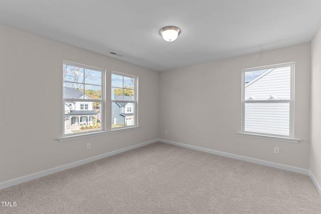 empty room with carpet floors