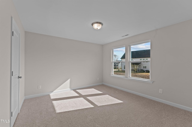 view of carpeted spare room